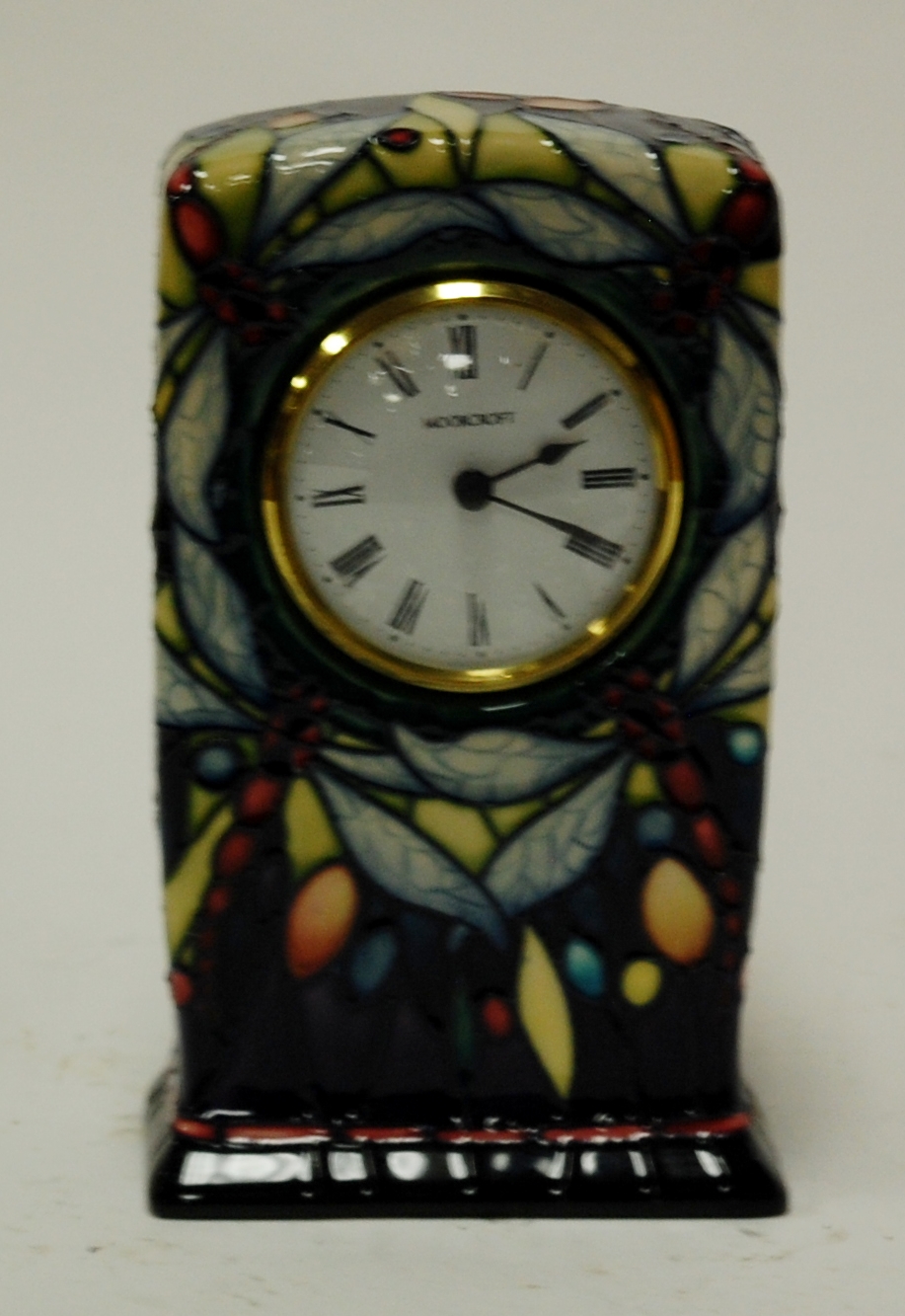 A modern Moorcroft mantel clock in the Dragonfly pattern, impressed mark verso, dated 2000,