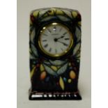 A modern Moorcroft mantel clock in the Dragonfly pattern, impressed mark verso, dated 2000,