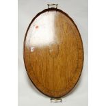 An Edwardian mahogany and satinwood inlaid twin handled oval gallery tray