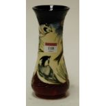A modern Moorcroft vase in the Inglewood pattern designed by Phillip Gibson,