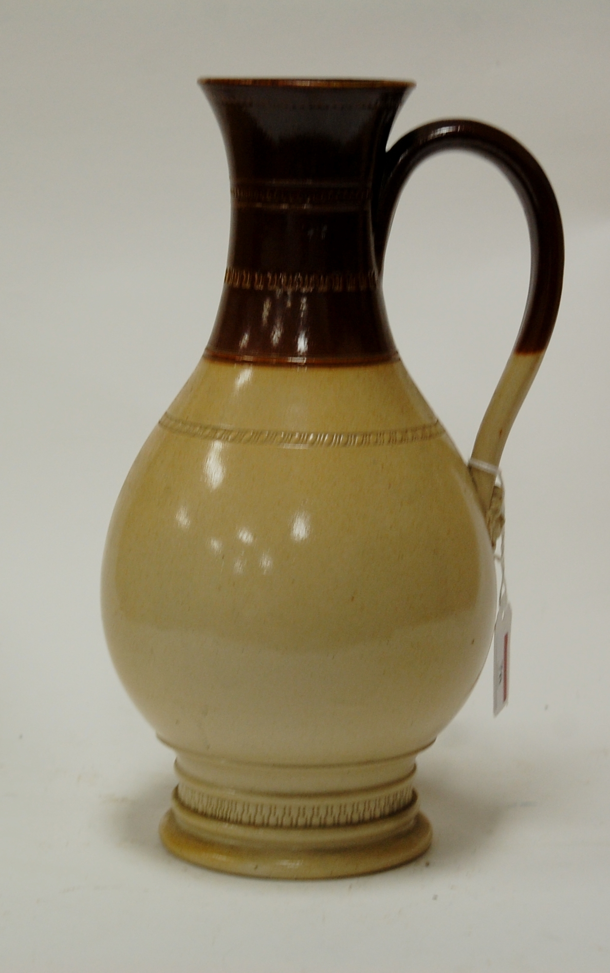 A late 19th century salt glazed stoneware jug Condition Report / Extra Information