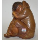 A Lladro figure of a seated Eskimo child, h.