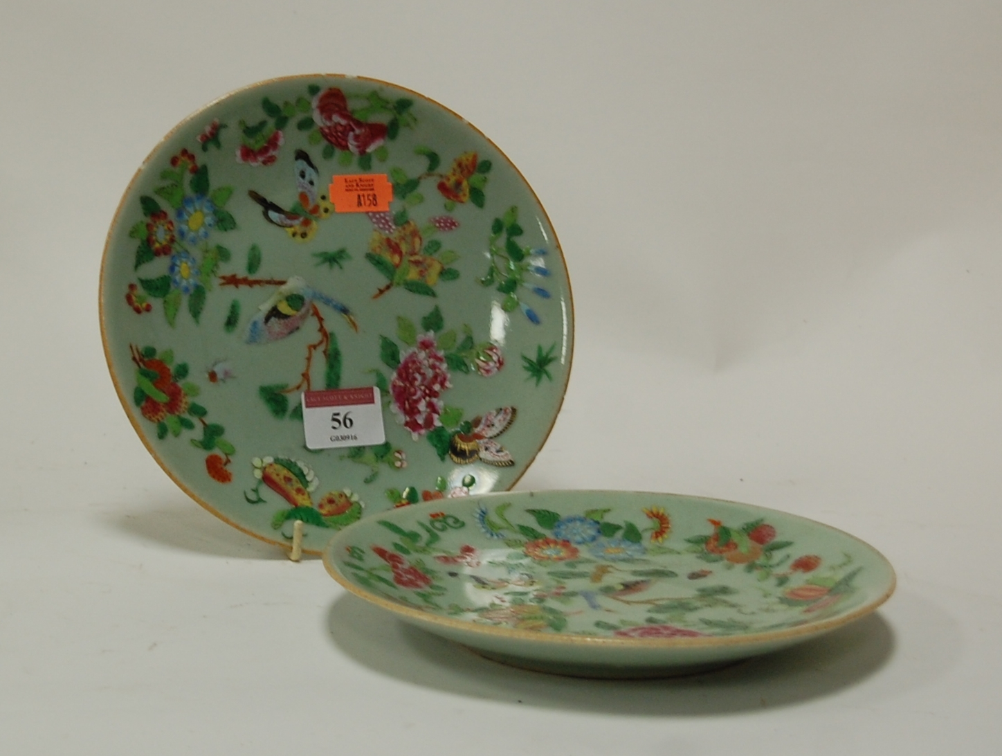 A pair of Chinese Celadon glazed stoneware plates,