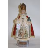 A mid-20th century painted plaster religious figure,