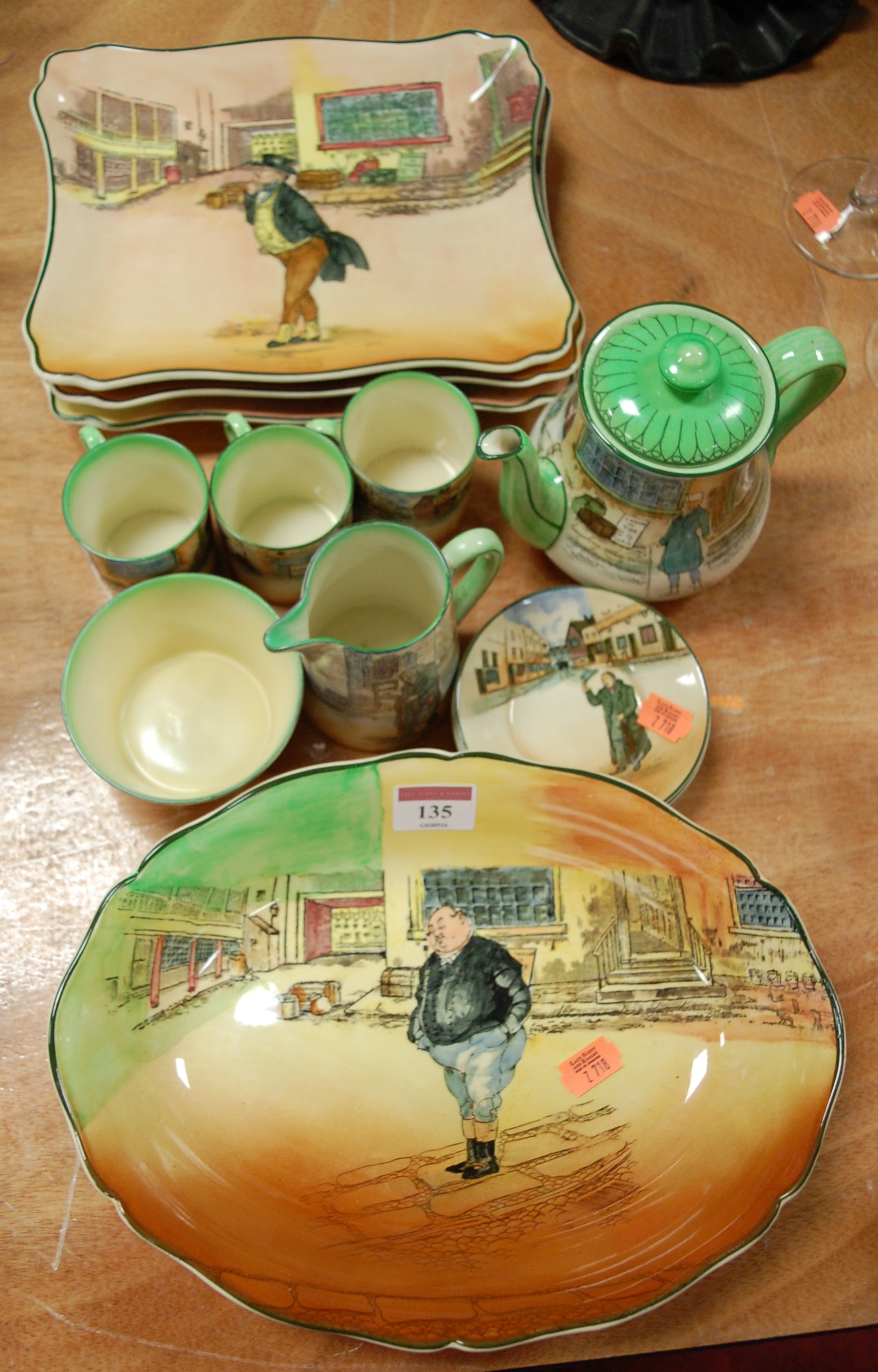 A collection of assorted Royal Doulton Dickensware to include oval bowl 'The Fat Boy',