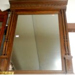 A late 19th century continental oak framed wall mirror, w.