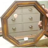 A moulded oak framed octagonal wall mirror, w.