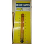 A Duckhams enamel advertising sign, with integrated thermometer, 91 x 33.