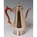 A silver coffee pot, in the Queen Anne style,