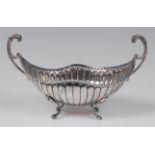 A 19th century continental white metal sweetmeat bowl, of boat shape,