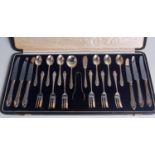 A cased silver six place setting of afternoon tea cutlery, comprising teaspoons,