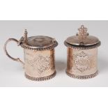 A matched pair of mid-Victorian silver mustard pots,