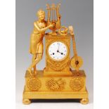 A large French Empire gilt bronze mantel clock by Le Roi,