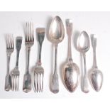 An early 19th century silver harlequin part cutlery suite, in the Fiddle pattern,