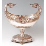 A Mappin & Webb Rococo Revival silver table centrepiece, of boat shape,