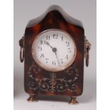 An Edwardian tortoiseshell and silver small mantel clock,