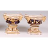 A pair of early 19th century Derby porcelain pot pourri, each of squat circular form,