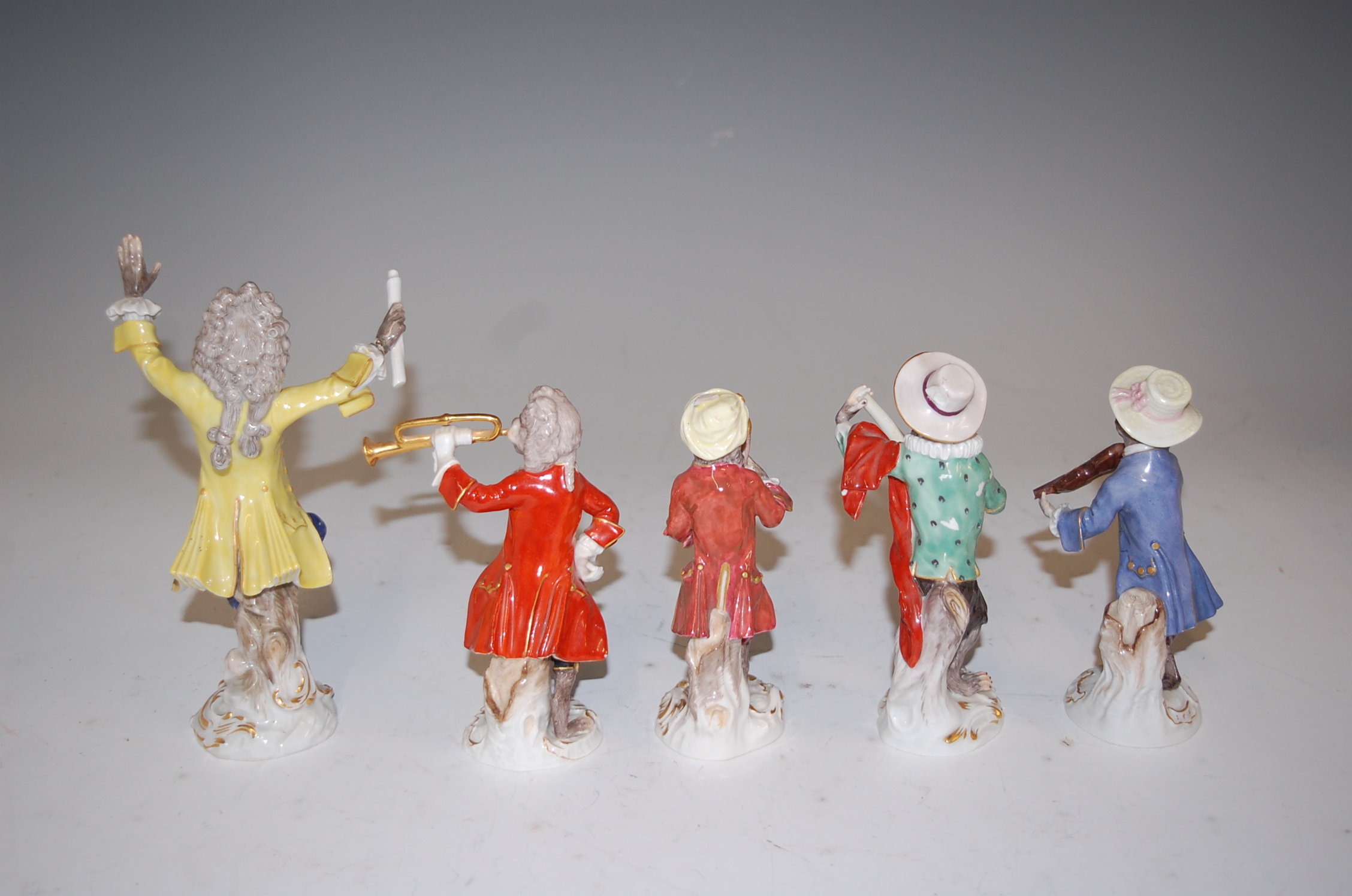 A set of five Meissen porcelain monkey band figures, comprising of the conductor and four musicians, - Image 6 of 8