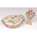 A 19th century porcelain pot pourri bowl and cover, having all-over floral encrusted decoration,