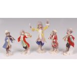 A set of five Meissen porcelain monkey band figures, comprising of the conductor and four musicians,