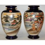 A pair of mid-20th century Japanese satsuma vases, of baluster form,