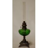 An early 20th century oil lamp,