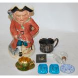 An early 20th century continental musical Toby jug; together with a Coalport coffee can and saucer;