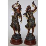 A pair of early 20th century spelter figures of classical maidens