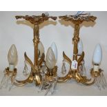 A pair of modern gilt metal three branch ceiling light fittings,