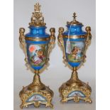 A pair of late 19th century French porcelain and gilt metal mounted garniture urns,