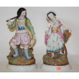 A pair of early 20th century continental bisque porcelain figures of a gallant and his companion