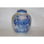 A 19th century Dutch Delft blue and white tobacco jar of cover,