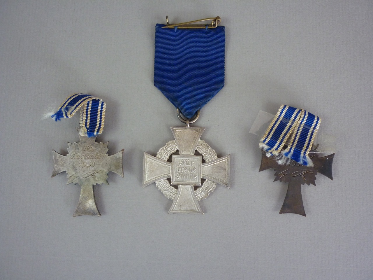 Two German Third Reich Mothers' Crosses and a Faithful Service Medal - Image 2 of 2