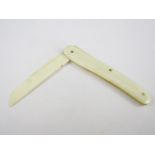 A Victorian ivory folding paper knife