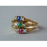 A late Victorian diamond, sapphire, emerald and ruby dress ring, in a triple band arrangement with