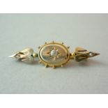 A Victorian Etruscan Revival gold plated brooch, set with paste brilliants