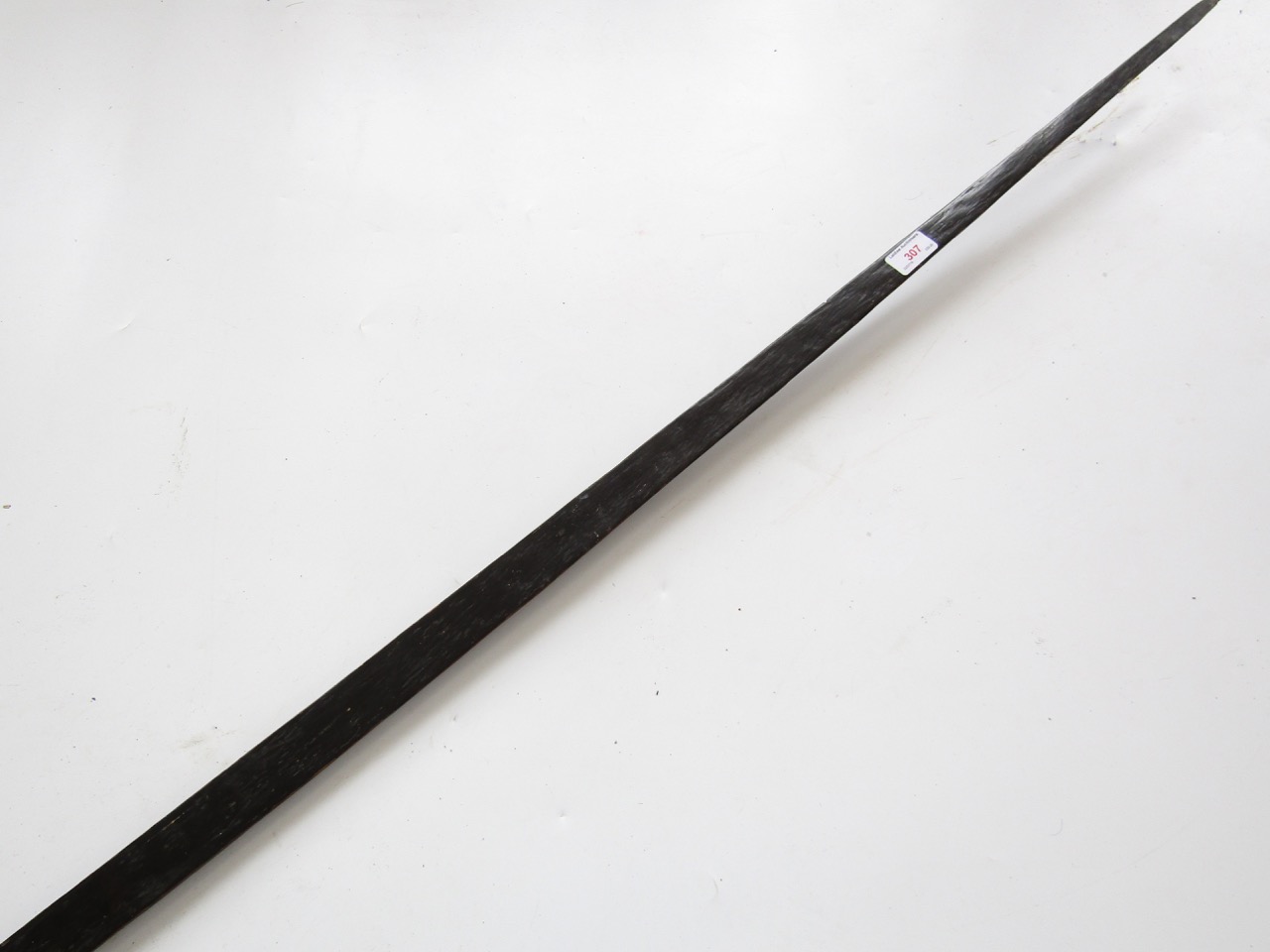 An antique ethnic palm wood long bow, 193 cm