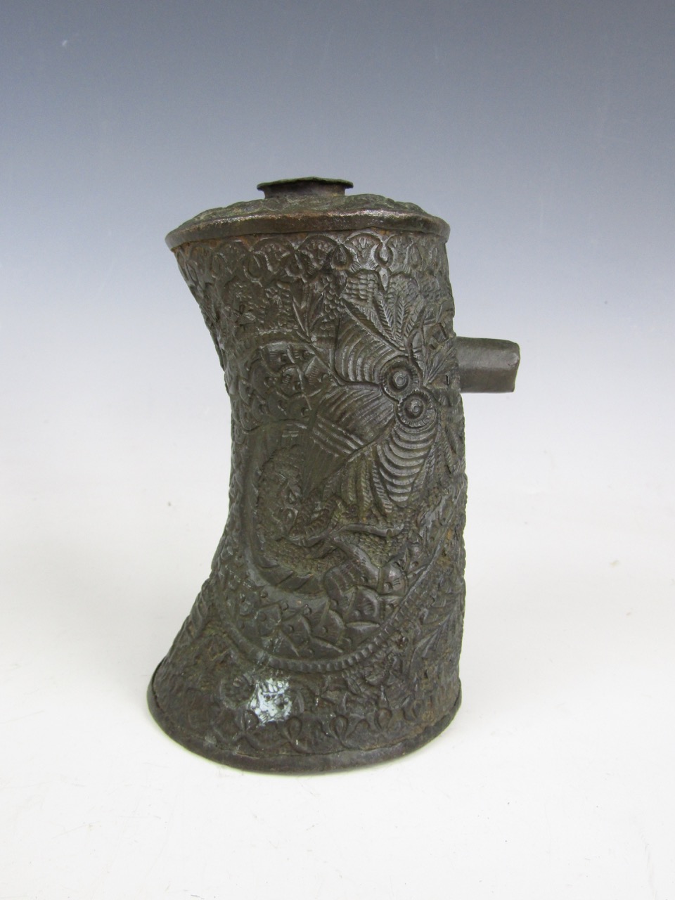 An antique Chinese or Asian copper flask, chased overall in a pattern of sea monsters or dragons, - Image 2 of 3