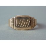 A 19th Century gentleman's rose coloured yellow-metal signet ring, the matrix engraved with the