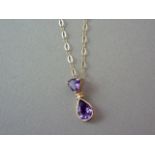 An amethyst pendant necklace, with a pear-shaped faceted stone of approximately 0.65mm, bezel set in