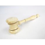 A 19th Century turned ivory gavel, 13 cm