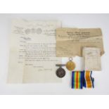 A British War and Victory Medal pair to K29739T E Martin, Sto 1, Royal Navy, together with a Naval