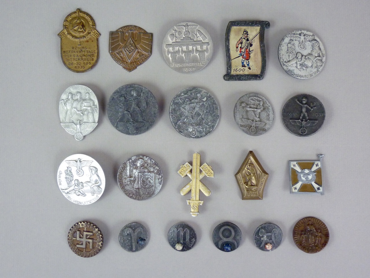 A quantity of German Third Reich day badges