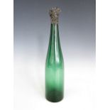 An early Victorian emerald green glass perpendicular cylinder decanter, silver mounted with a