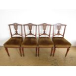 Four late Victorian elaborately inlaid and veneered rosewood standard chairs