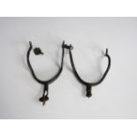 A pair of Medieval rowel spurs in excavated condition
