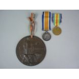 A British War and Victory Medal pair with Memorial Plaque, those of 30102 Pte Garfield Marr King's