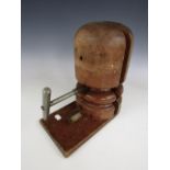 A late 19th / early 20th Century turned beechwood hat stretcher, 32 cm