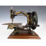 A Royal Sewing Machine Company The Shakespeare manual sewing machine, black lacquered and gilt,