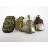 Four late 19th / early 20th Century novelty vesta cases, modelled in the form of a violin and a